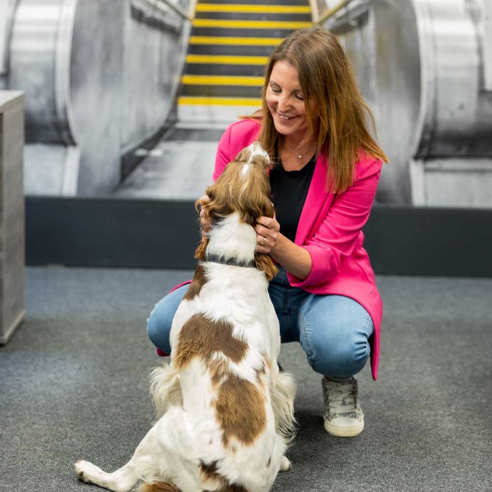 Hannah Martin staff photo with dog