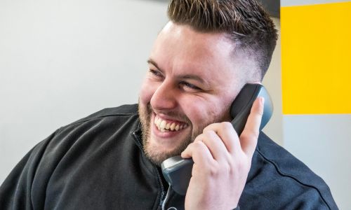 Man using phone in office