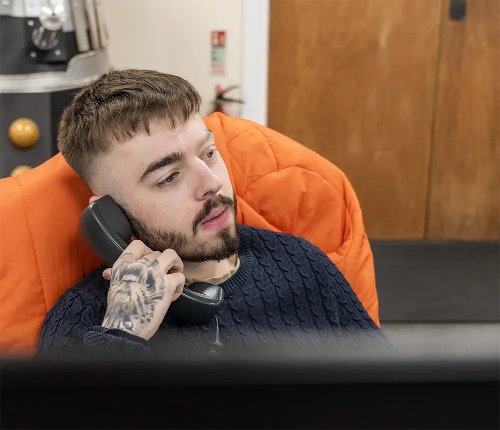 Man using phone in office