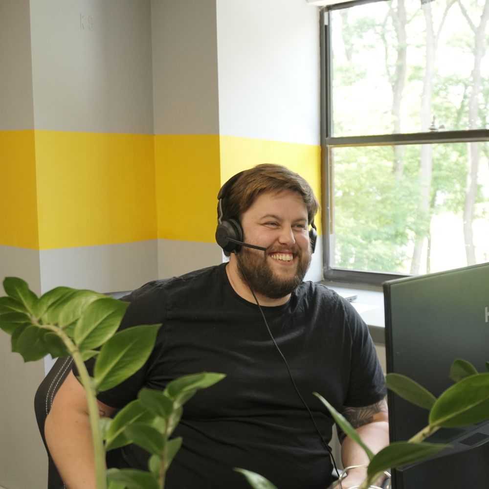 enableVoice man smiling with headset