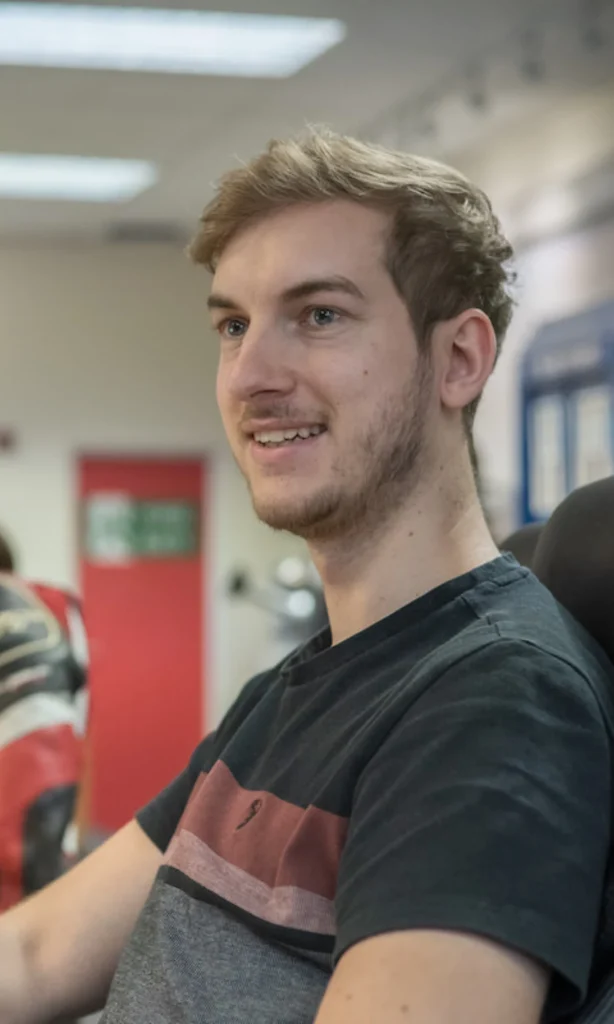 a person looking at a computer screen