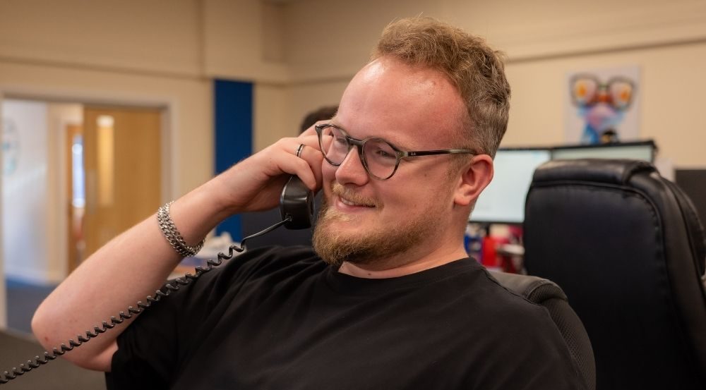 Man on phone smiling