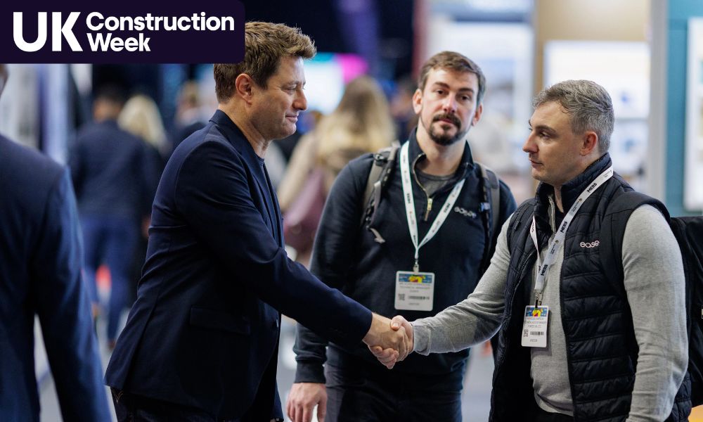 UK Construction week logo with two men shaking hands
