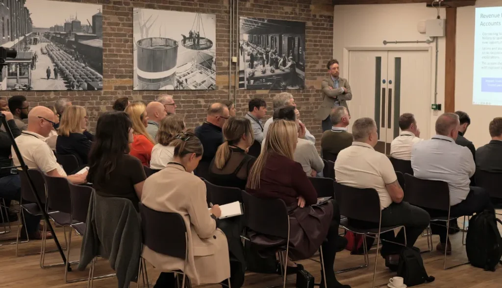 image showing people sitting down at an event