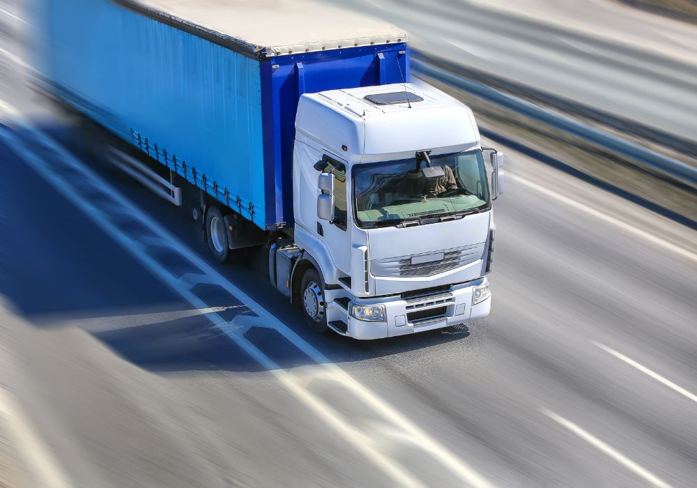 freight lorry driving on motorway